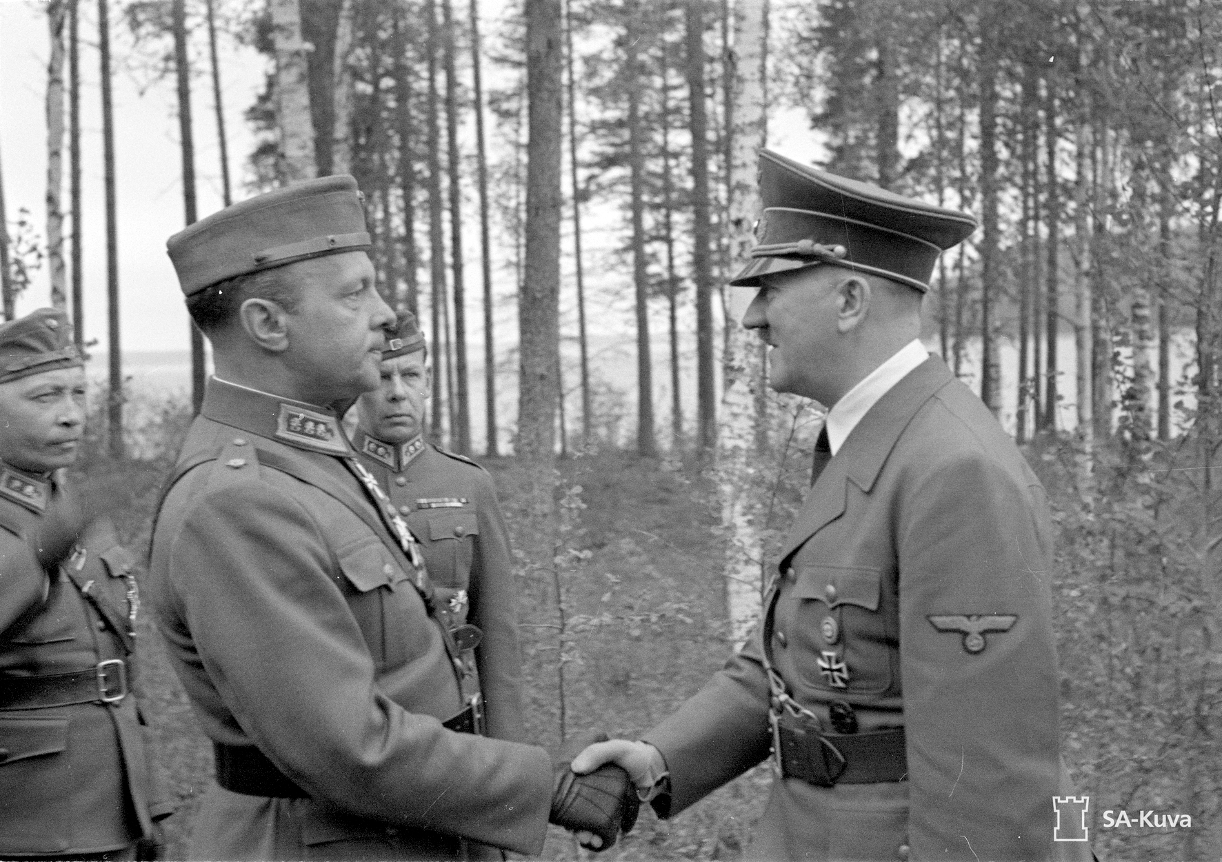 Adolf Hitler greets a Finnish officer during his visit in Finland